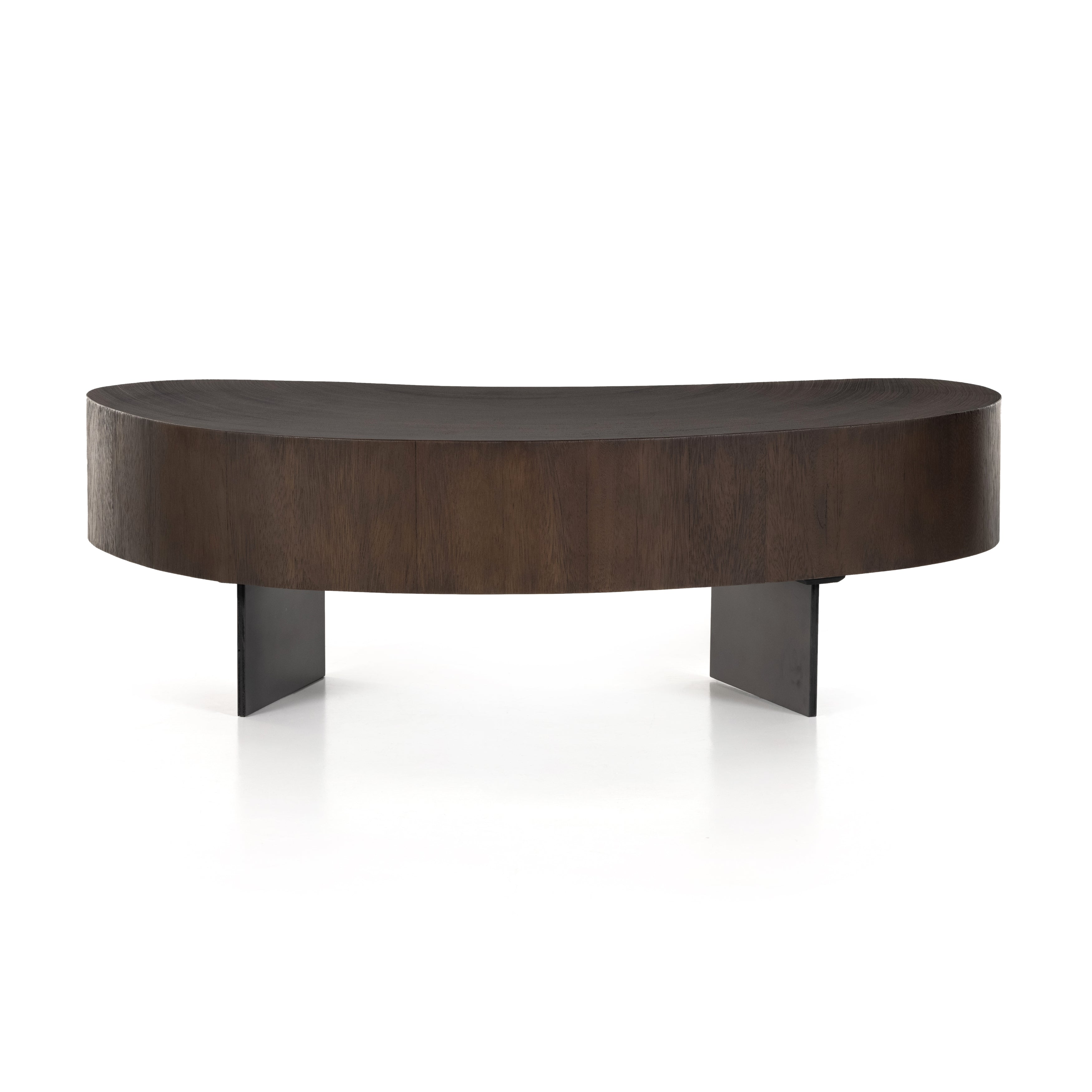 Natural beauty. Total novelty. A thick slab of oyster-cut Guanacaste forms a tall, kidney-shaped coffee table. Visible rings speak to woods' natural graining, with a dark gunmetal-finished base below. Amethyst Home provides interior design, new construction, custom furniture, and area rugs in the Calabasas metro area.