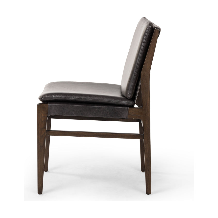 Modern and transitional, burnt oak nettlewood frames this armless dining chair. Finished with a top-grain leather exclusive to Four Hands. Amethyst Home provides interior design, new construction, custom furniture, and area rugs in the Calabasas metro area.