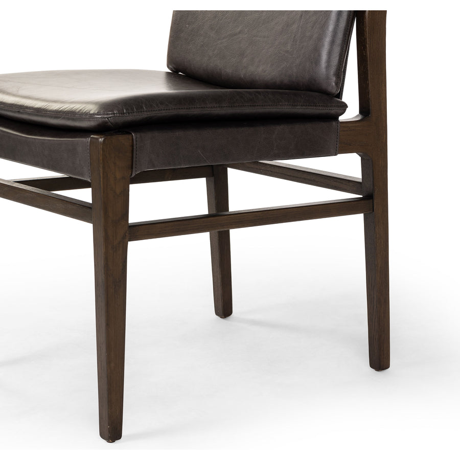 Modern and transitional, burnt oak nettlewood frames this armless dining chair. Finished with a top-grain leather exclusive to Four Hands. Amethyst Home provides interior design, new construction, custom furniture, and area rugs in the Washington metro area.