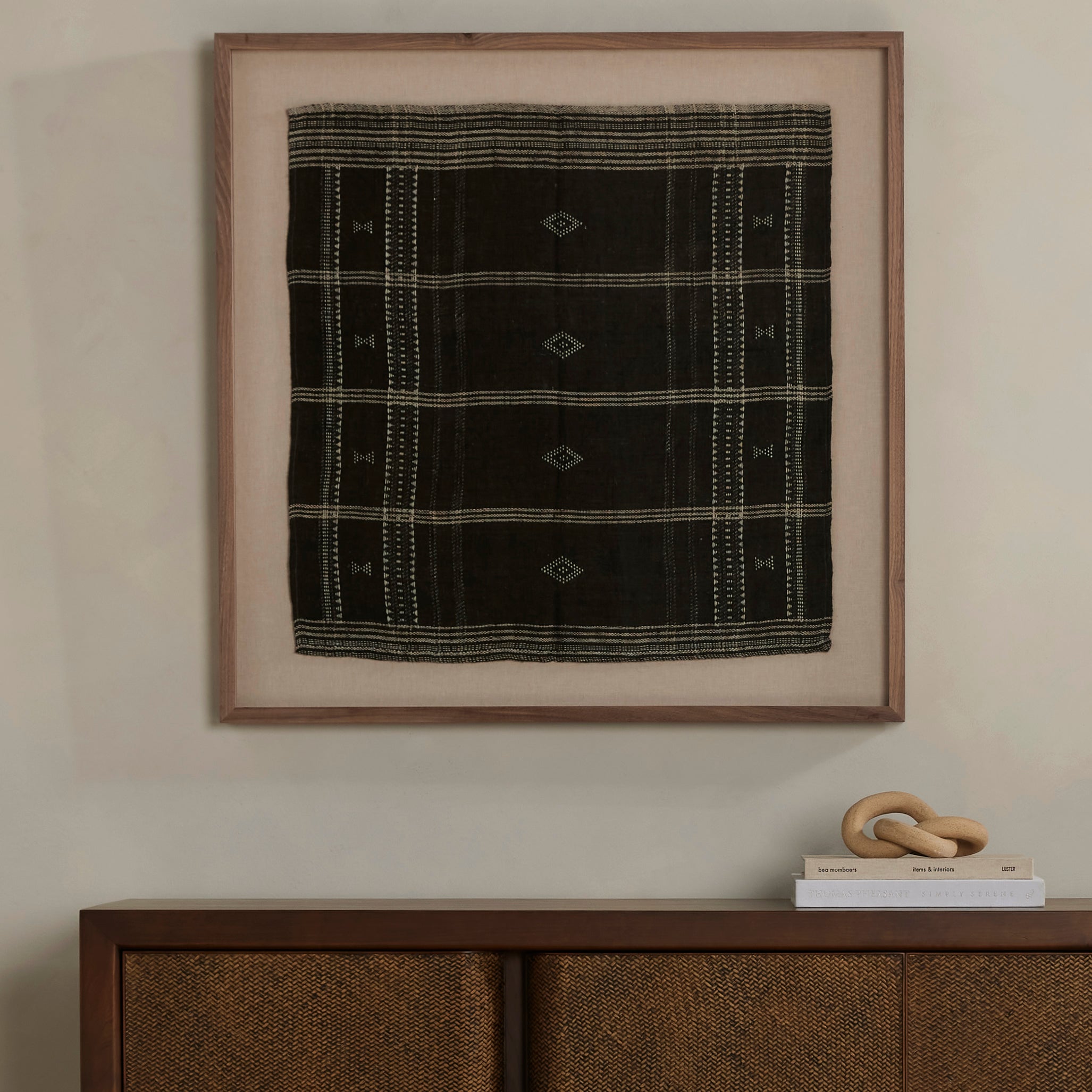 A 500-year-old tradition comes to life on this 100% wool, handwoven textile. Crafted on a traditional frame loom following a tradition created by the Vankars of the Bhujodi village in India, a process that can take up to two days to complete. Finished with fringe tassels on both ends. If not currently in stock, this piece ships within three weeks. Amethyst Home provides interior design, new home construction design consulting, vintage area rugs, and lighting in the Calabasas metro area.