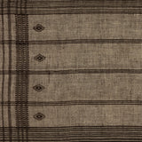 A Bhujodi-style textile is framed within rustic walnut for a gallery-quality look. Handmade in Austin, Texas. Amethyst Home provides interior design, new home construction design consulting, vintage area rugs, and lighting in the Newport Beach metro area.