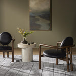 Featuring Bria Heirloom Black Chair by Four Hands at Amethyst Home. A playful take on Italian modernism. Solid parawood crafts a slim, curved frame and rear mock-tripod. Upholstered in black top-grain leather. Sourced from one of the oldest family-owned tanneries in Italy’s Bassano del Grappa, our heirloom leather covering is salvaged and processed from up. Amethyst Home provides interior design, new home construction design consulting, vintage area rugs, and lighting in the Washington metro area.