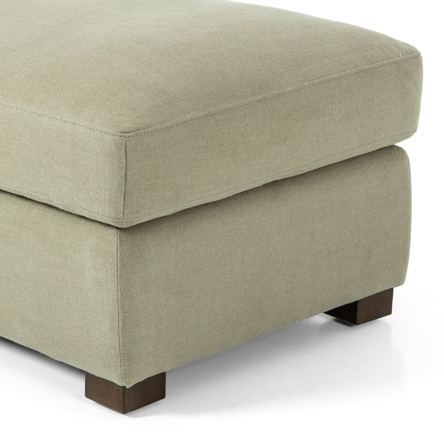Traditional styling gets a modern spin. Feather-blend cushioning accents simple parawood feet. This lounge-worthy ottoman features sustainably made Belgian Linen™. Naturally durable and soft to the touch, Libeco™-sourced linens are artisan-made without toxic chemicals. Amethyst Home provides interior design, new home construction design consulting, vintage area rugs, and lighting in the Charlotte metro area.