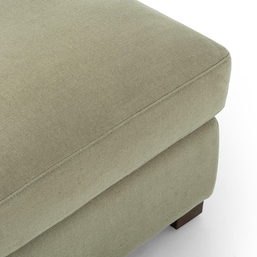 Traditional styling gets a modern spin. Feather-blend cushioning accents simple parawood feet. This lounge-worthy ottoman features sustainably made Belgian Linen™. Naturally durable and soft to the touch, Libeco™-sourced linens are artisan-made without toxic chemicals. Amethyst Home provides interior design, new home construction design consulting, vintage area rugs, and lighting in the Washington metro area.
