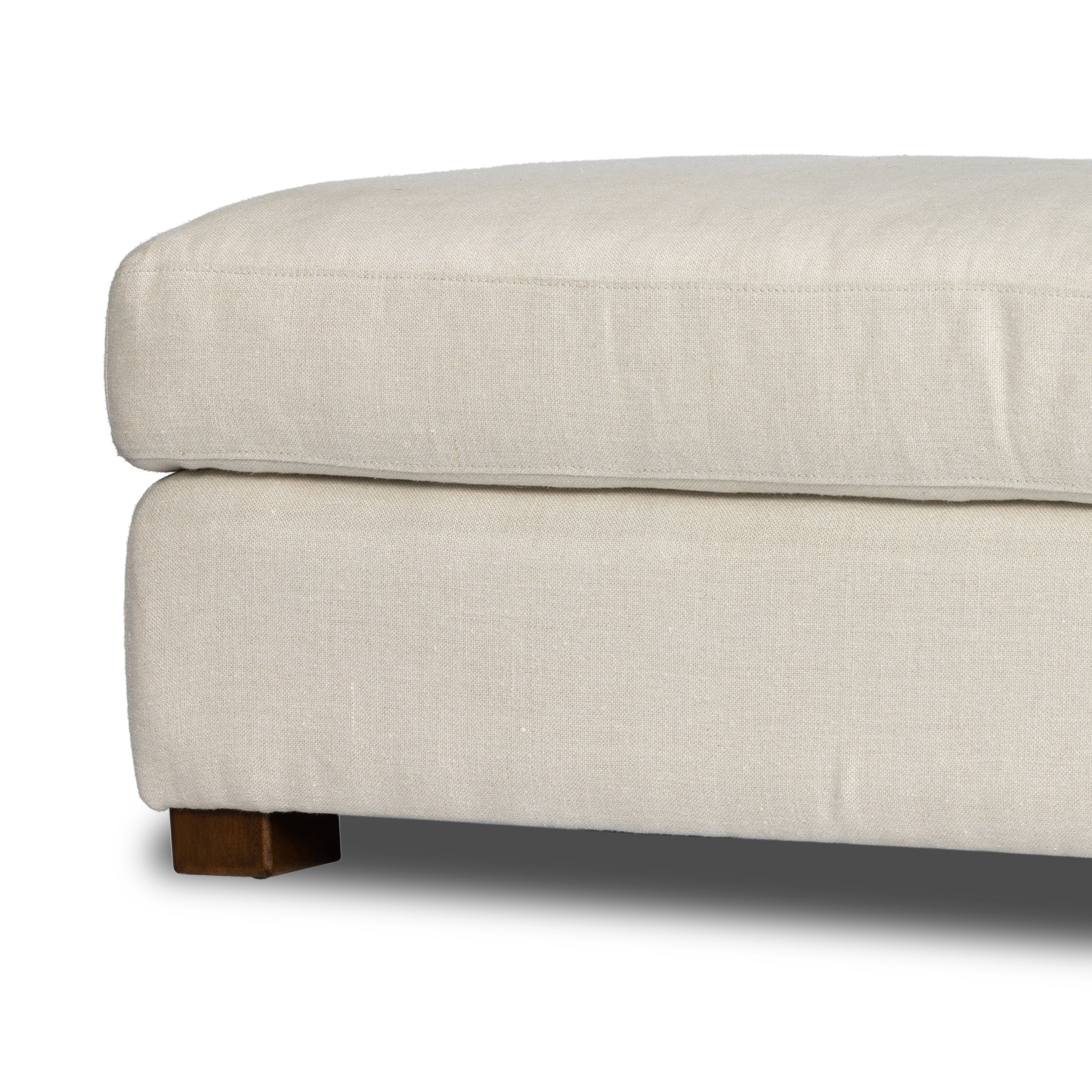 Traditional styling gets a modern spin. Feather-blend cushioning accents simple parawood feet. This lounge-worthy ottoman features sustainably made Belgian Linenâ„¢. Naturally durable and soft to the touch, Libecoâ„¢-sourced linens are artisan-made without toxic chemicals. Amethyst Home provides interior design, new construction, custom furniture and area rugs in the Portland metro area