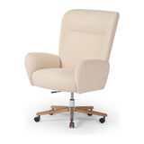 An executive-style chair is upholstered in a high-performance fabric, with subtle curves for a dramatic look and comfortable sit. Casters and seat heigh adjustability for ease in the modern office. Amethyst Home provides interior design, new construction, custom furniture, and area rugs in the Tampa metro area.