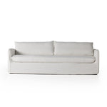 Capella Bergamo Cream Slipcover Sofa is clean and casual with contemporary touches. A cotton- and linen-blend slipcovered sofa features tapered arms and flange detailing for a sharp silhouette. Feather-blend knife-edge cushions mean total comfort. Slipcover machine washable for modern ease. Amethyst Home provides interior design services, furniture, rugs, and lighting in the Austin metro area.