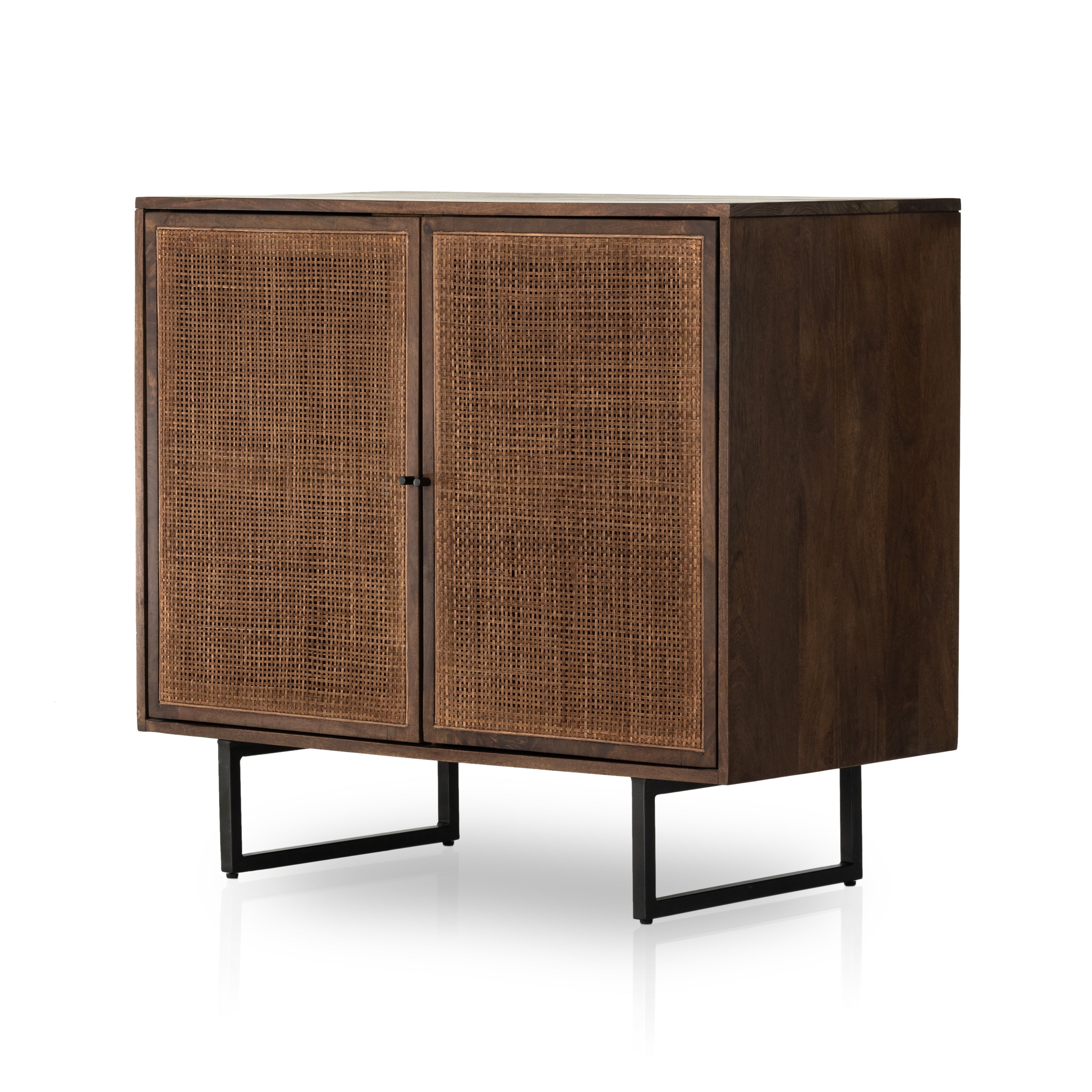 Featuring Carmel Brown Wash Small Cabinet by Four Hands at Amethyst Home. Rich texture and organic spirit are conveyed through an eye-catching mixture of the Carmel Brown Wash Cabinet, mango woods, cotton rope, and natural cane. Iron accents adopt gunmetal finishes, refreshing forms’ iconic mid-century influence, as a clean-lined aesthetic is met with modern functionality.
Overall Dimension. Amethyst Home provides interior design services, furniture, rugs, and lighting in the Charlotte metro area.