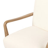 Add timeless midcentury design to your table with this Danish-inspired dining chair. Fluid oak arms and cream upholstery create a chair that embodies both comfort and style.Collection: Ashfor Amethyst Home provides interior design, new home construction design consulting, vintage area rugs, and lighting in the Laguna Beach metro area.
