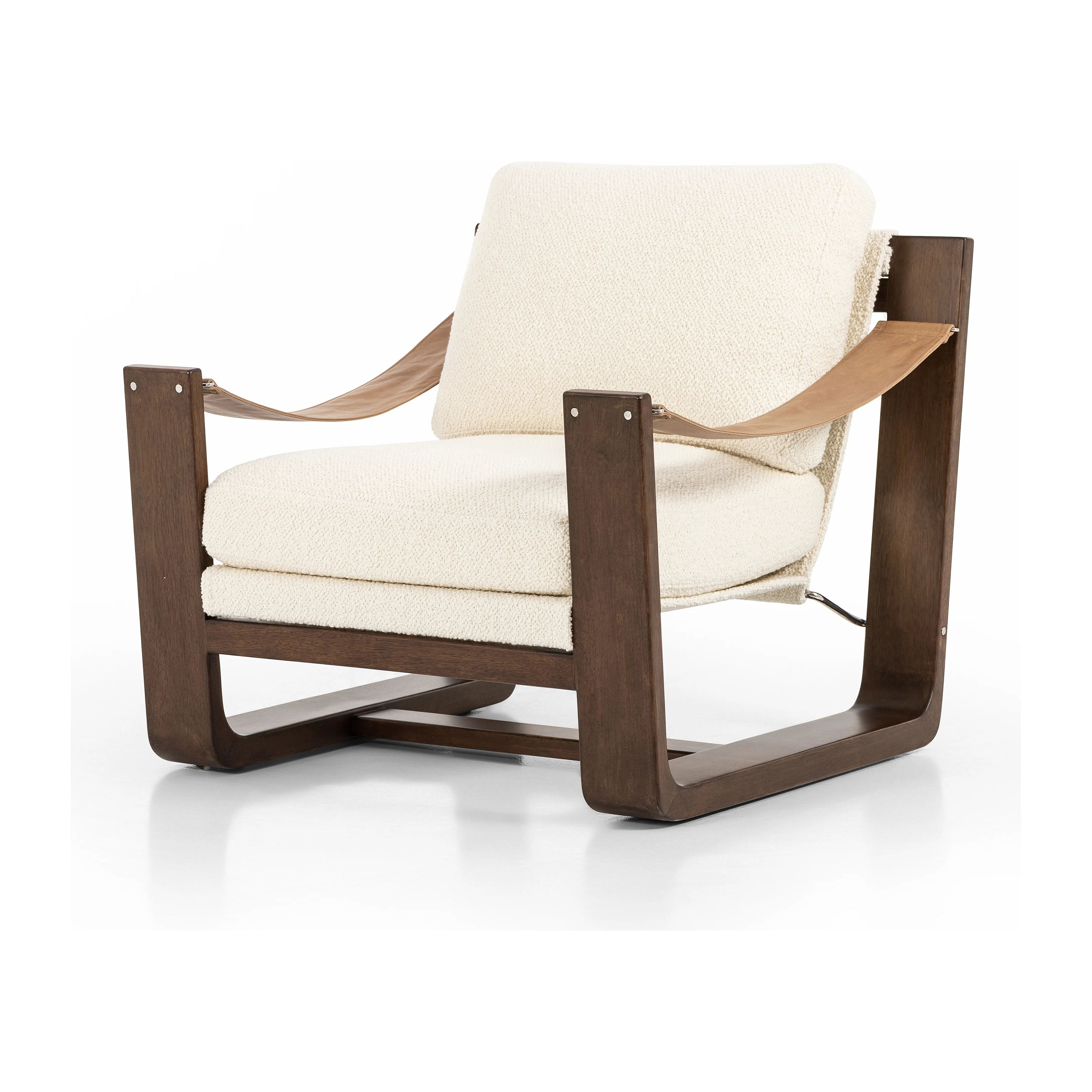 The classic sling chair gets a grand, elevated look. Solid wood frame is shaped, curved and smoothed on all edges. Cushioned seat and back are upholstered in top-grain leather. Amethyst Home provides interior design, new home construction design consulting, vintage area rugs, and lighting in the Alpharetta metro area.