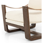 The classic sling chair gets a grand, elevated look. Solid wood frame is shaped, curved and smoothed on all edges. Cushioned seat and back are upholstered in top-grain leather. Amethyst Home provides interior design, new home construction design consulting, vintage area rugs, and lighting in the Tampa metro area.
