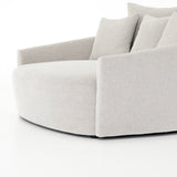 Roomy style. Off-white high-performance fabric covers a dramatic U shape for a spacious, sink-in sit. Throw pillows present an added touch of comfort to this sensibly styled media lounger, perfect for movie nights. Amethyst Home provides interior design, new home construction design consulting, vintage area rugs, and lighting in the Tampa metro area.