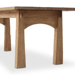 Made from light-finished pine, tapered legs and thick stretchers speak to the Swedish inspiration behind this 10-person dining table. Arched base cutouts soften a clean rectangular tabletop.Collection: Cordell Amethyst Home provides interior design, new home construction design consulting, vintage area rugs, and lighting in the Washington metro area.