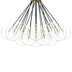 Clear glass bulbs dangle for a statement-making centerpiece. Each globe is individually blown, shaped and sculpted by hand through a one-hour process. Brass and glass are 98% recyclable. Designed and sustainably crafted in Poland by Schwung.Overall Dimensions47.00"w x 47.00"d x 33.50"hFull Details &amp; SpecificationsTear Shee Amethyst Home provides interior design, new home construction design consulting, vintage area rugs, and lighting in the Scottsdale metro area.