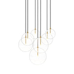 Clear glass spheres dangle at varying lengths for a stunning effect. Each globe is individually blown, shaped and sculpted by hand through a one-hour process. Brass and glass are 98% recyclable. Designed and sustainably crafted in Poland by Schwung.Overall Dimensions29.00"w x 30.75"d x 32.25"hFull Details &amp; SpecificationsTear Shee Amethyst Home provides interior design, new home construction design consulting, vintage area rugs, and lighting in the Park City metro area.