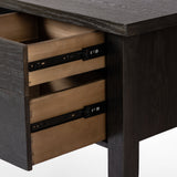 Made from oak veneer with a deep charcoal finish, this executive-size desk delivers ultimate storage, including four drawers on one side plus six open cubbies on the other, granting the option to float-style in a room. Partially turned legs add a design-forward finishing touch. Amethyst Home provides interior design, new construction, custom furniture, and area rugs in the Newport Beach metro area.