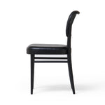 Inspired by the Thonet chair popularized in the mid-century, the Court Black Ash Dining Chair forms a simple but-shapely frame for black seating and a natural cane back. Amethyst Home provides interior design services, furniture, rugs, and lighting in the Calabasas metro area.