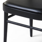 Inspired by the Thonet chair popularized in the mid-century, the Court Black Ash Dining Chair forms a simple but-shapely frame for black seating and a natural cane back. Amethyst Home provides interior design services, furniture, rugs, and lighting in the Des Moines metro area. 