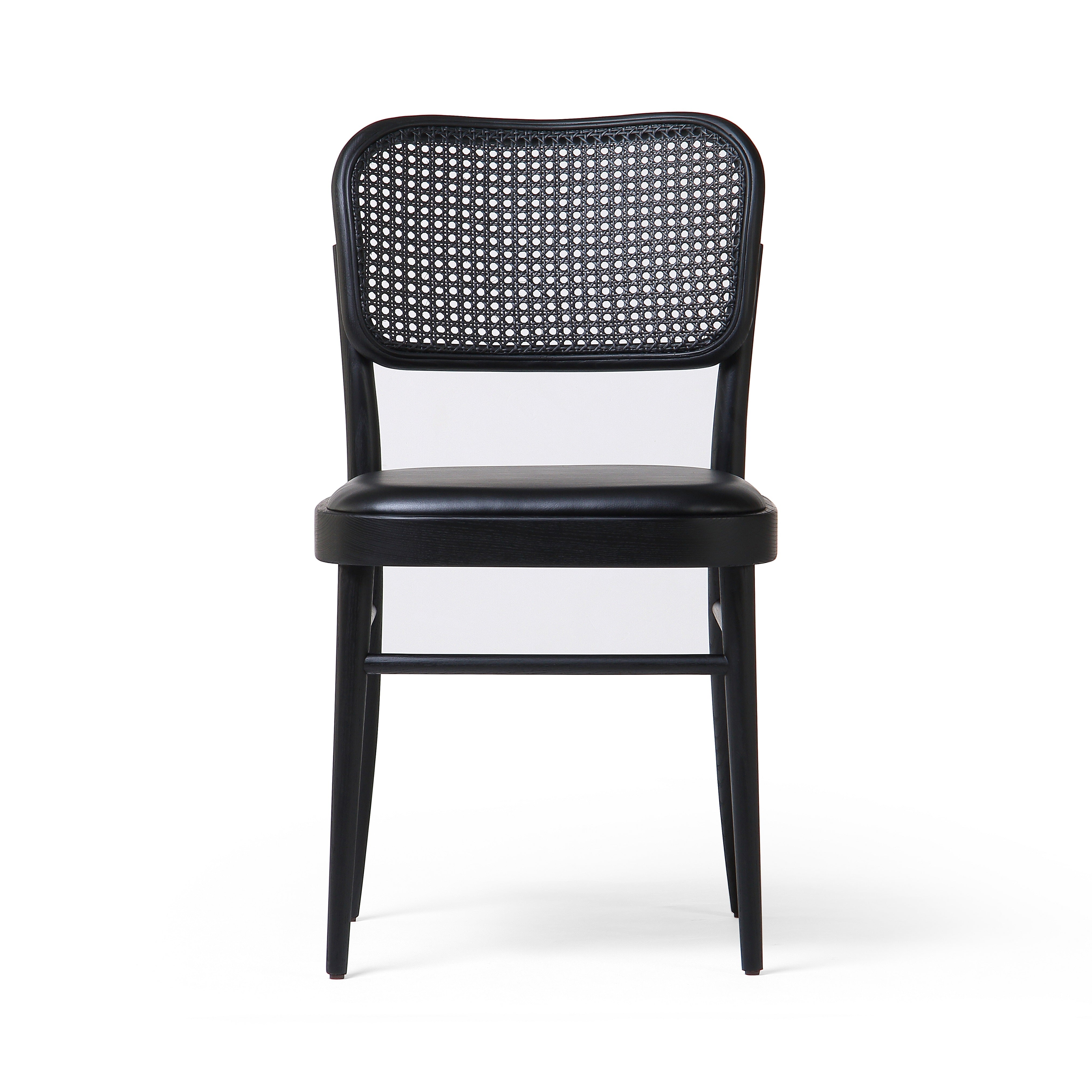 Inspired by the Thonet chair popularized in the mid-century, the Court Black Ash Dining Chair forms a simple but-shapely frame for black seating and a natural cane back. Amethyst Home provides interior design services, furniture, rugs, and lighting in the Salt Lake City metro area. 