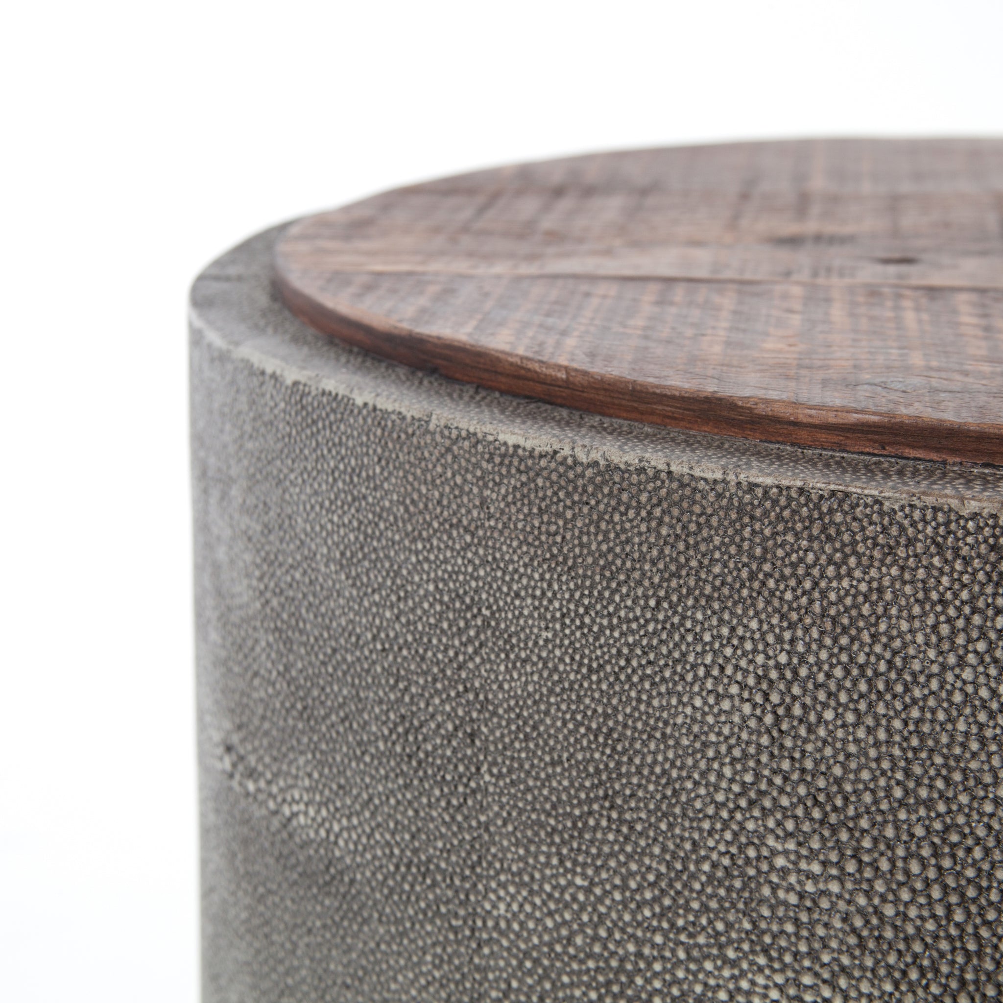 Mixed materials and the simplest of shapes are sized to make a perfect side table. Reclaimed peroba wood is supported by a textural faux shagreen base in soft grey. This piece is designed in collaboration with Thomas Bina. Amethyst Home provides interior design, new construction, custom furniture, and area rugs in the Portland metro area.