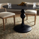 Finished in an antique black, raw aluminum shapes a bistro-style dining table with a turned, geometric look. Seats four comfortably. Amethyst Home provides interior design, new construction, custom furniture, and area rugs in the Seattle metro area.