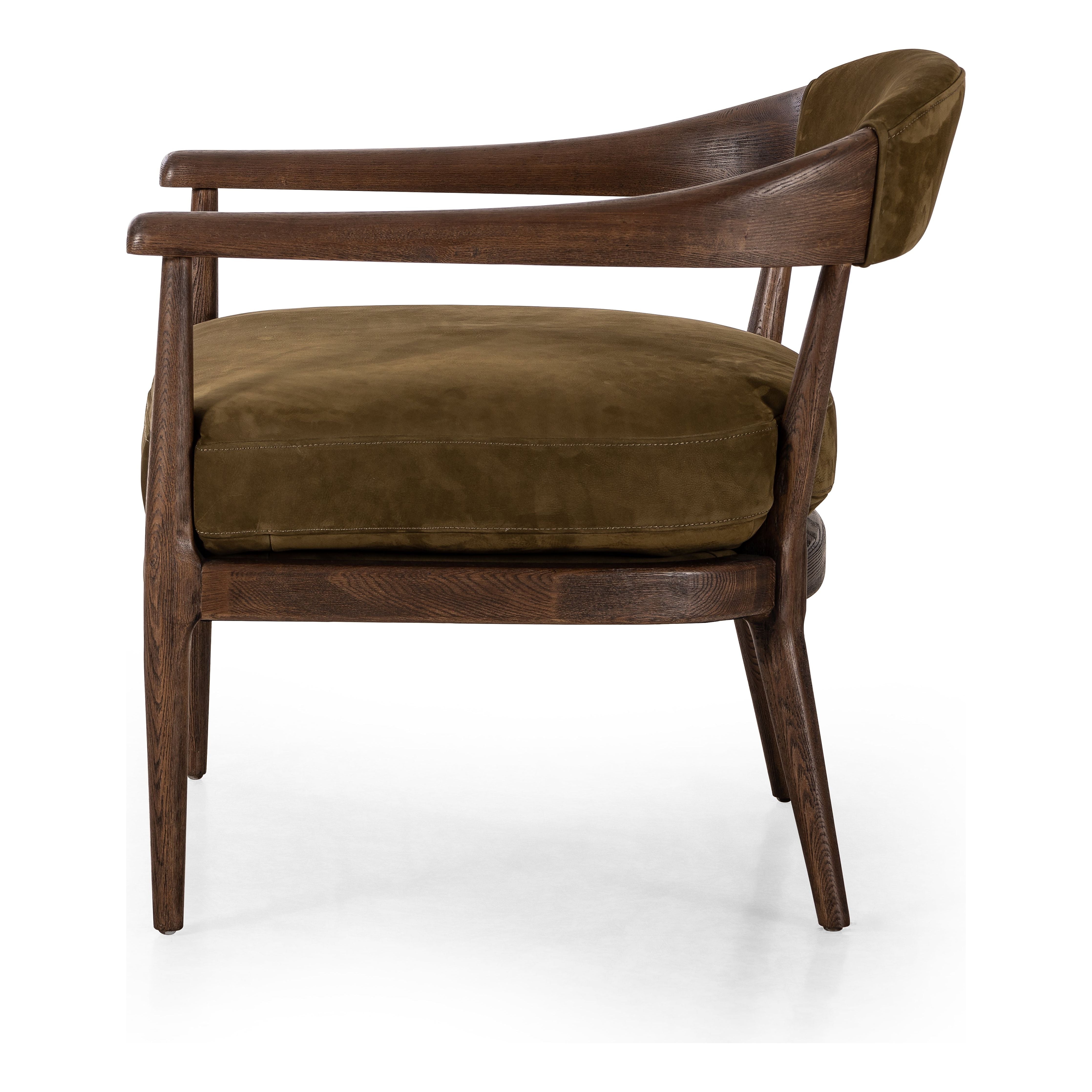 Safari styling is brought to modern speed on this vintage-inspired chair. Its solid wood frame features a webbed seating structure that brings a sink-in feel to the entire piece. The upholstered back, strap details and loose cushion are finished in a rich Italian-made leather with a soft, buttery feel and subtle highs and lows throughout the hide that bring movement to the entire piece. Amethyst Home provides interior design, new construction, custom furniture, and area rugs in the Calabasas metro area.