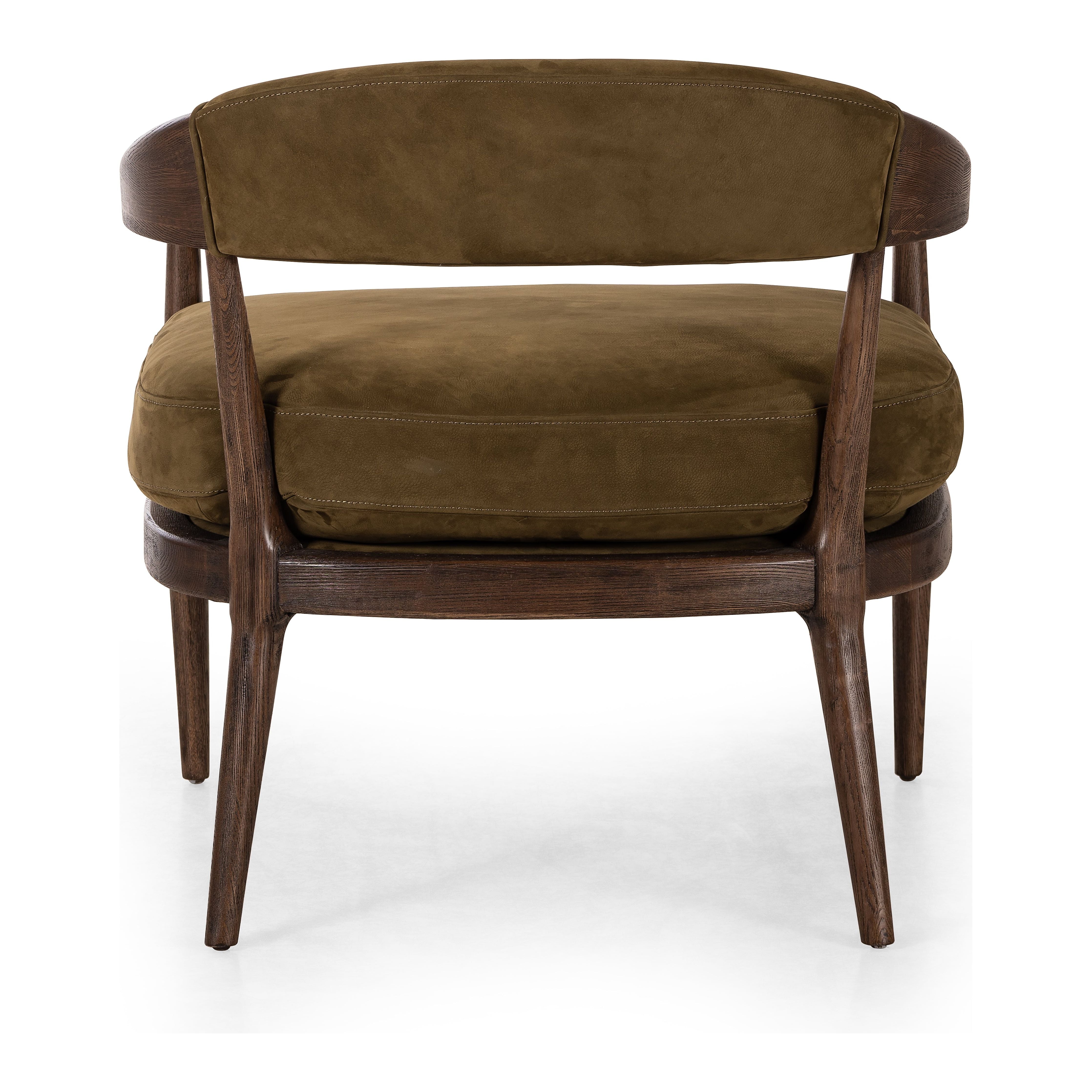 Safari styling is brought to modern speed on this vintage-inspired chair. Its solid wood frame features a webbed seating structure that brings a sink-in feel to the entire piece. The upholstered back, strap details and loose cushion are finished in a rich Italian-made leather with a soft, buttery feel and subtle highs and lows throughout the hide that bring movement to the entire piece. Amethyst Home provides interior design, new construction, custom furniture, and area rugs in the Houston metro area.