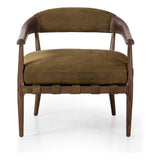 Safari styling is brought to modern speed on this vintage-inspired chair. Its solid wood frame features a webbed seating structure that brings a sink-in feel to the entire piece. The upholstered back, strap details and loose cushion are finished in a rich Italian-made leather with a soft, buttery feel and subtle highs and lows throughout the hide that bring movement to the entire piece. Amethyst Home provides interior design, new construction, custom furniture, and area rugs in the Miami metro area.