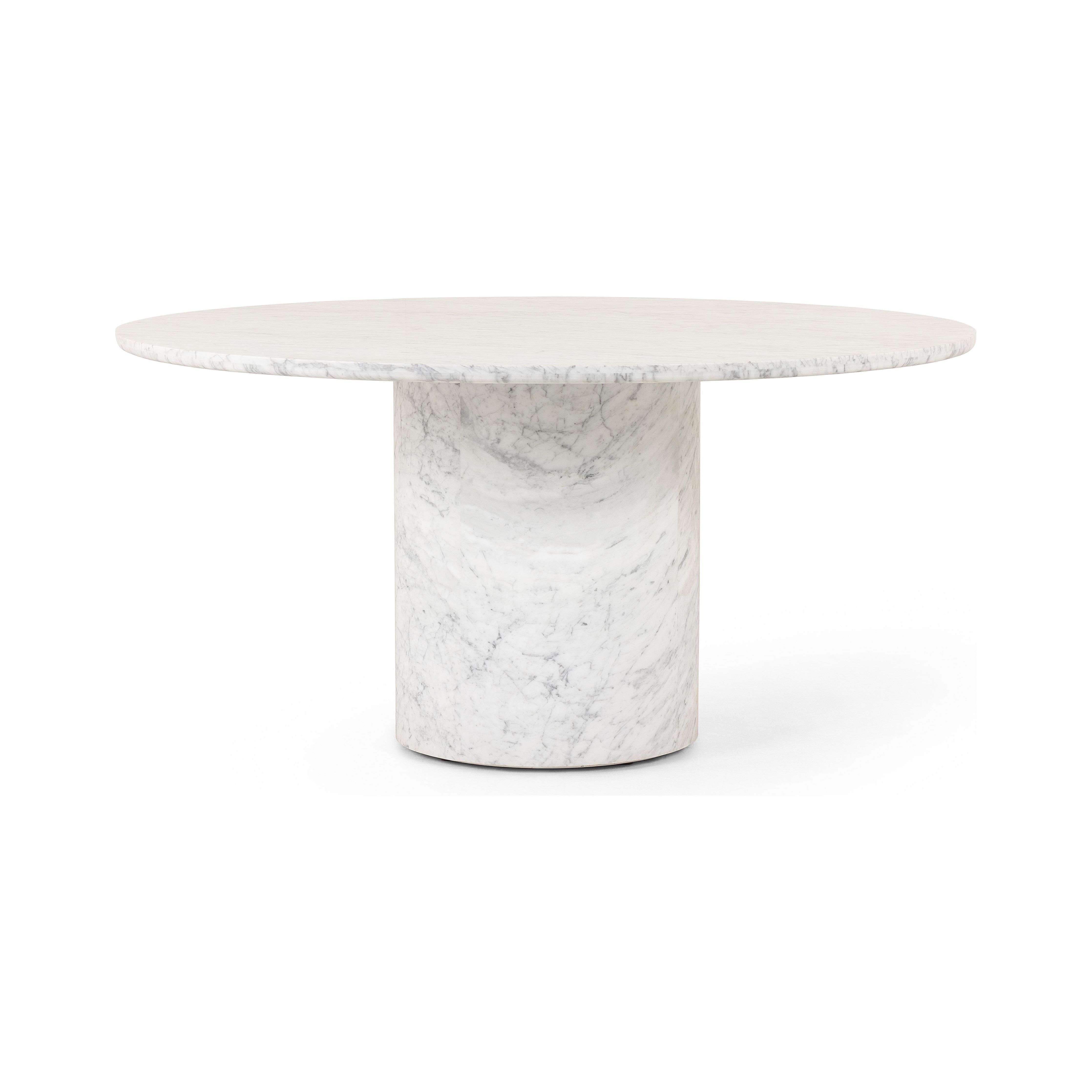A statement in marble, this dining table showcases a simple cylinder base with a round table top. Style in a dining room or entryway. Seats six comfortably. Amethyst Home provides interior design, new construction, custom furniture, and area rugs in the Winter Garden metro area.