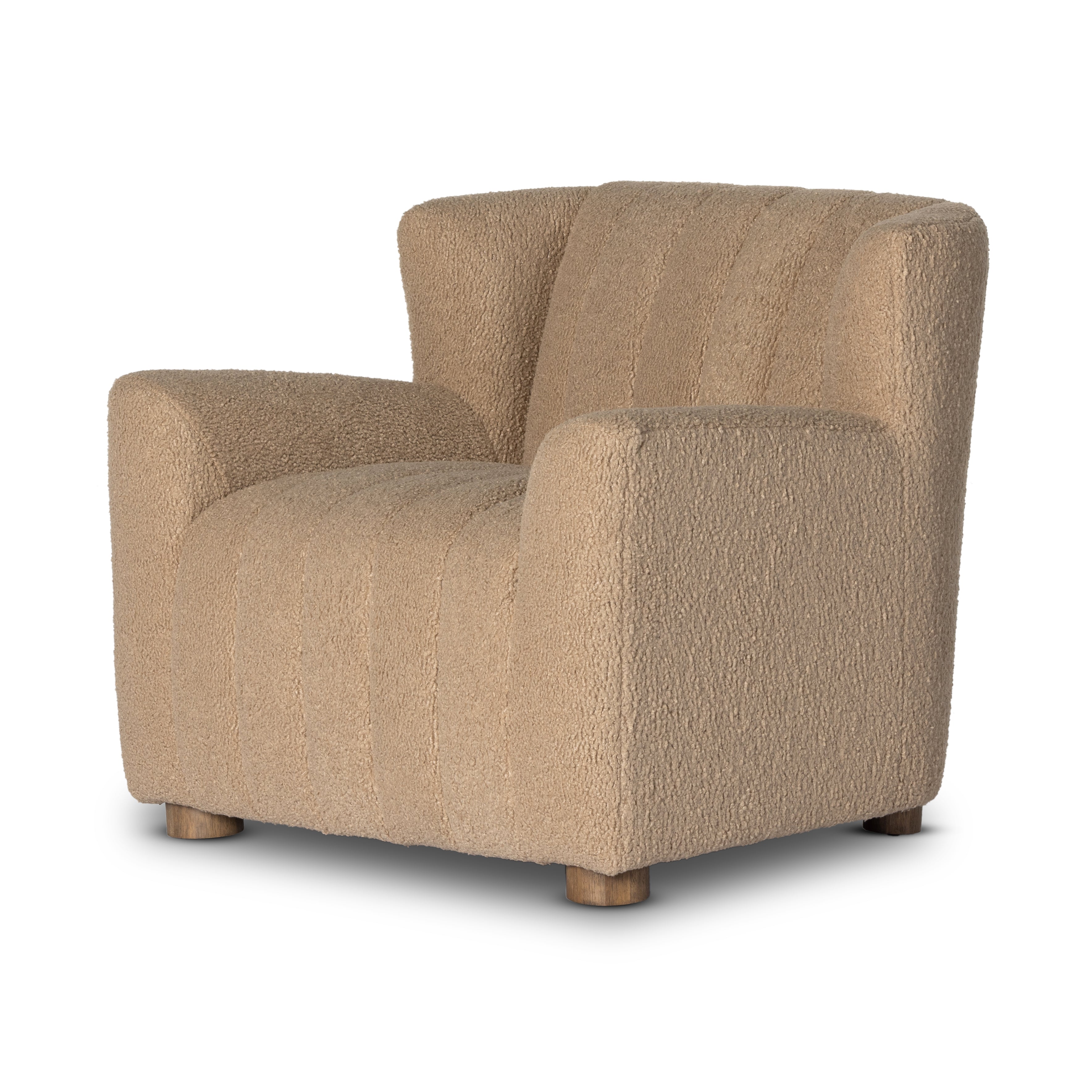 The classic wing-back club chair adopts heavy channeling for an even-comfier sit. Highly textural poly fiber fabric brings this retro lounge-inspired chair up to modern speed. Amethyst Home provides interior design, new construction, custom furniture and area rugs in the Washington metro area