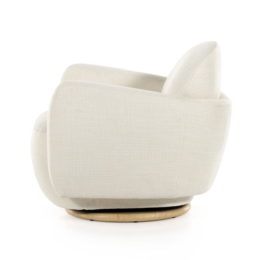 With the soft volume and exaggerated curves, the Enya Gibson White Swivel Chair is upholstered with high-performance fabric atop a plinth-style swivel base. Performance fabrics are specially created to withstand spills, stains, high traffic, and wear, ensuring long-term comfort and unmatched durability. Amethyst Home provides interior design services, furniture, rugs, and lighting in the Los Angeles metro area.