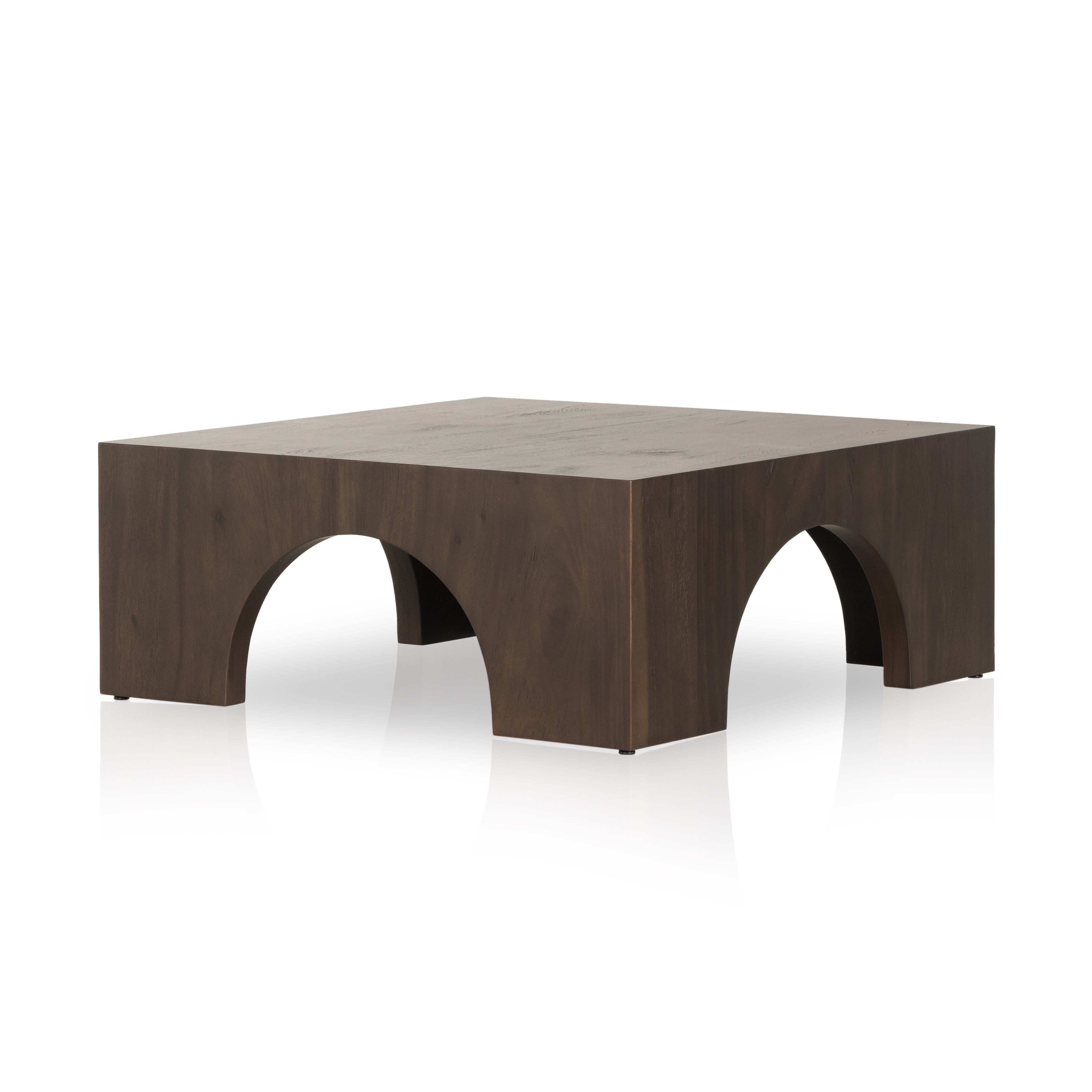 Clean and simple, with great impact. Made from beautiful Guanacaste in a natural hue, shapely arches and block corners speak to the architectural inspiration behind this eye-catching coffee table. Amethyst Home provides interior design, new construction, custom furniture, and area rugs in the Austin metro area.