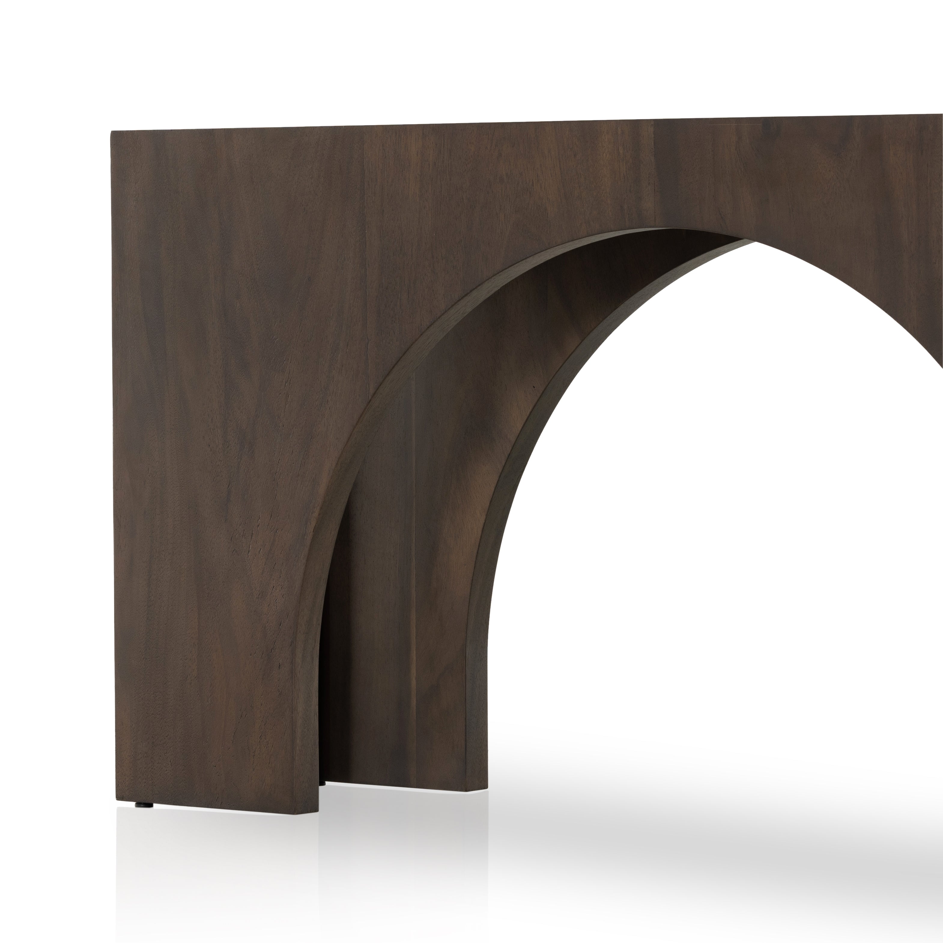 Clean and simple, with great impact. Made from smoked Guanacaste, shapely arches and block corners speak to the architectural inspiration behind this eye-catching console table. Amethyst Home provides interior design, new construction, custom furniture, and area rugs in the Miami metro area.