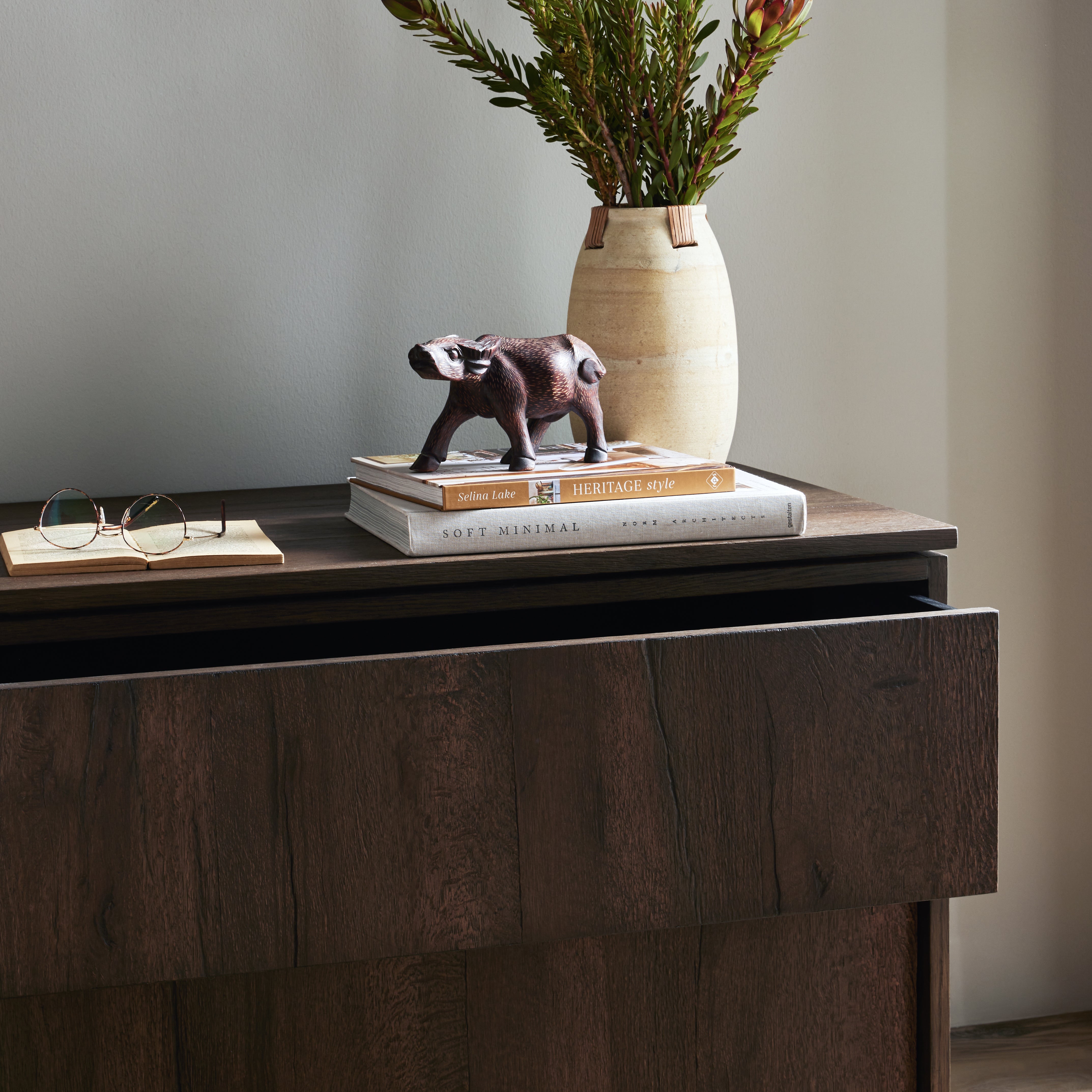Structured lines define the sleek, modern shape of this large nightstand. Dark oak finishing showcases heavy graining and detail. Amethyst Home provides interior design, new construction, custom furniture, and area rugs in the Nashville metro area.