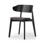 Featuring Franco Sonoma Black Upholstered Dining Chair by Four Hands at Amethyst Home. A fresh, exaggerated take on the wing-back dining chair. Finished a classic jet black, a mix of solid ash and ash veneer makes a modern and shapely seating statement with midcentury undertones. Complemented by a cushioned seat in black top-grain leather exclusive to Four Hands.Overall Dimension. Amethyst Home provides interior design, new construction, custom furniture, and area rugs in the Calabasas metro area.