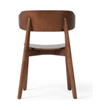 A fresh, exaggerated take on the wing-back dining chair. Finished in a natural hue, a mix of solid ash and ash veneer makes a modern and shapely seating statement with mid-century undertones. Amethyst Home provides interior design, new construction, custom furniture, and area rugs in the Miami metro area.