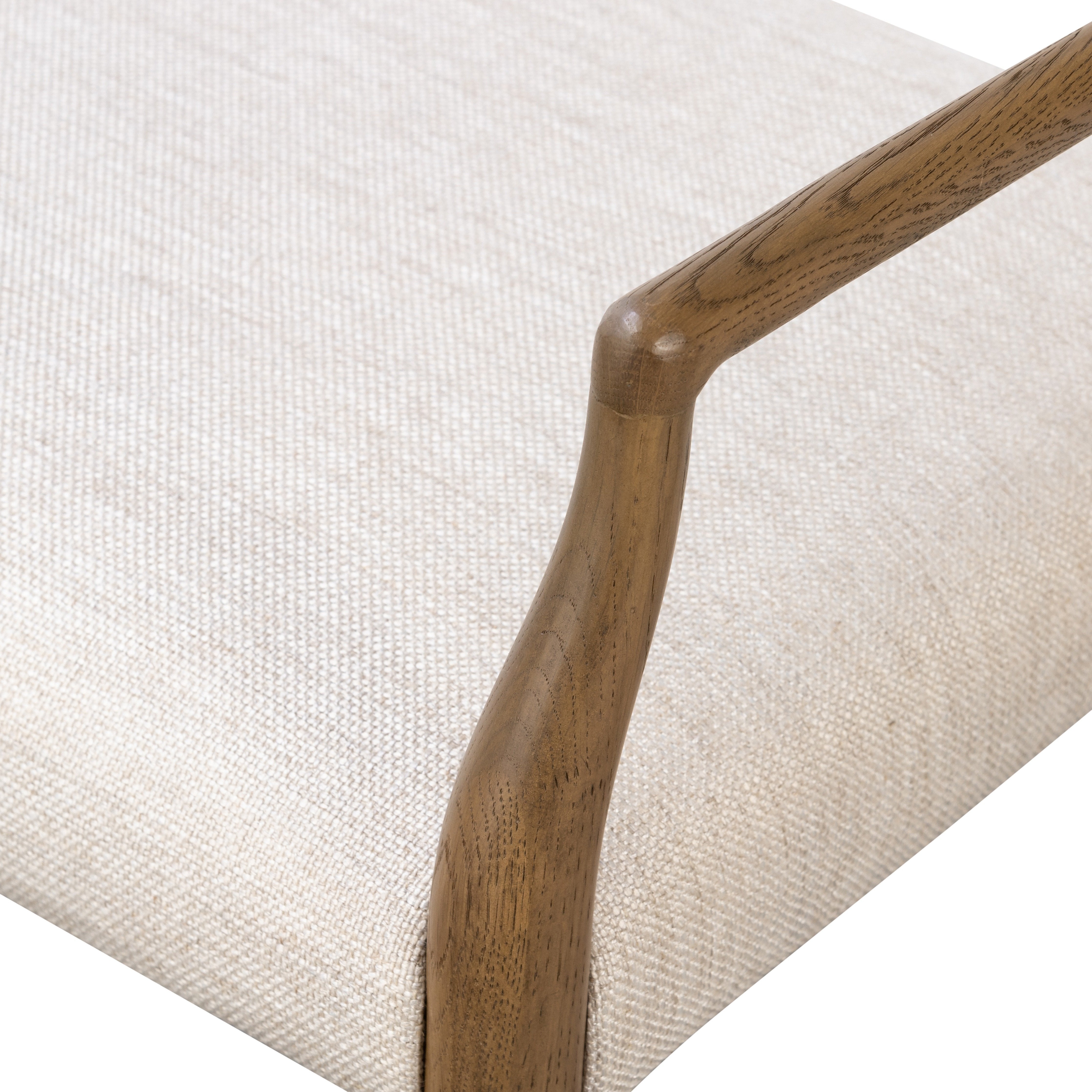 The classic ladderback chair, reimagined. Smoked solid oak frames a squared cotton- and linen-blend seat, for a textural feel and comfortable sit.Collection: Bolton Amethyst Home provides interior design, new home construction design consulting, vintage area rugs, and lighting in the Tampa metro area.