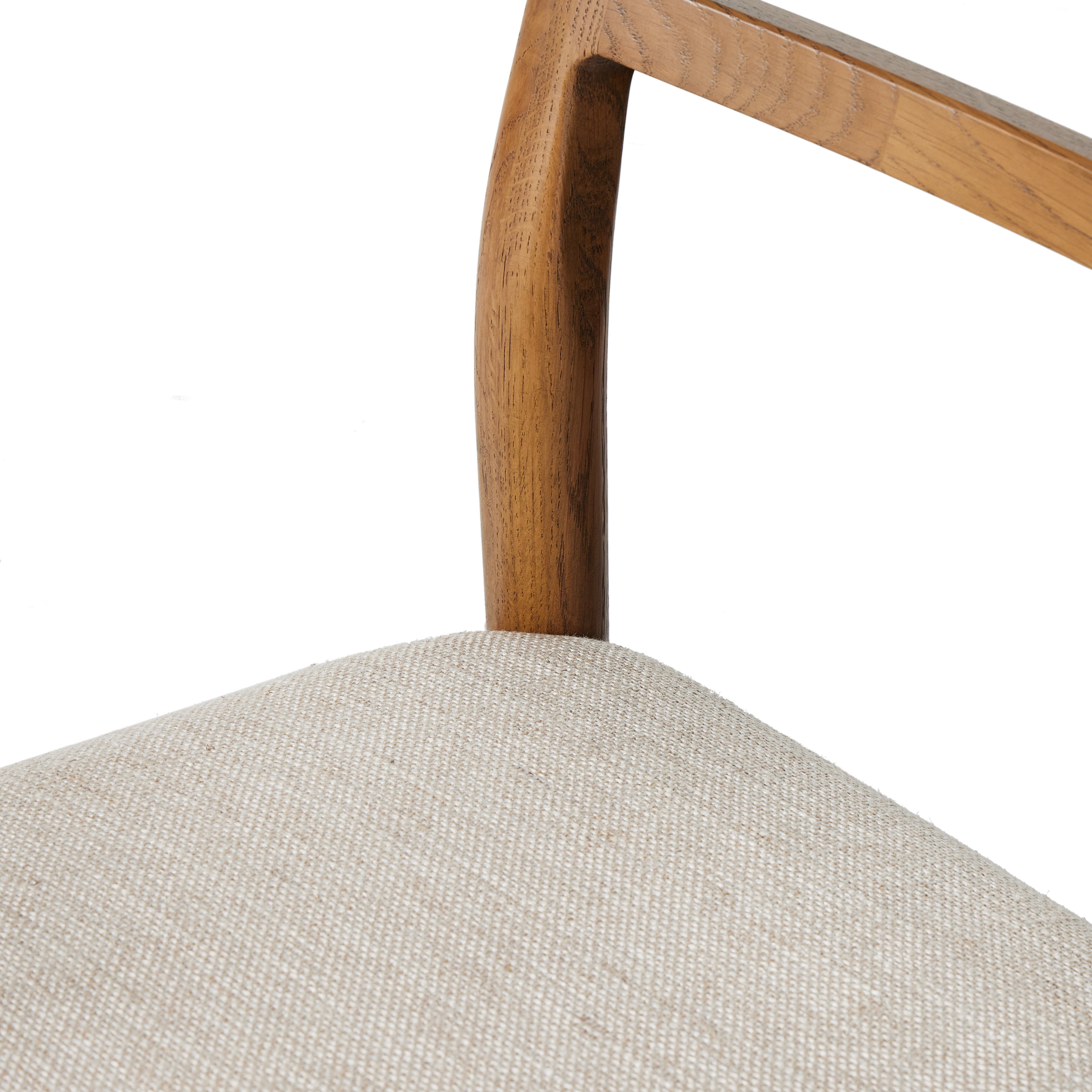 Textured materials redefine the classic ladderback chair, with a smoked oak frame and a comfortable seat of cotton and linen. Amethyst Home provides interior design, new construction, custom furniture, and area rugs in the Laguna Beach metro area.