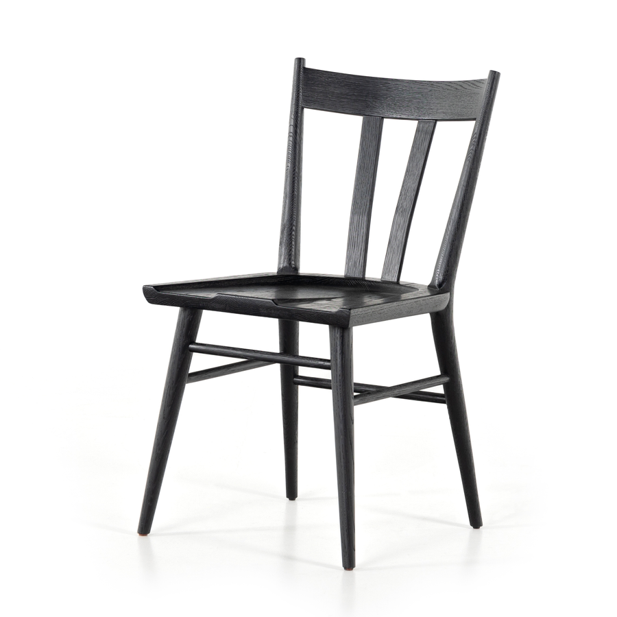 Finished in a beautifully classic black oak, the Gregory Black Oak Dining Chair features a yoke-like back and widened supports, placing a fresh twist on the traditional Windsor. Amethyst Home provides interior design, new construction, custom furniture, and rugs for the Kansas City metro area.