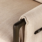 Details make the chair. With poly-blend performance fabric that wraps each arm, faux toggles add an element of interest to midcentury-inspired seating in a wheat hue, with softly sculpted parawood framing carrying out a beautiful neutral look. Amethyst Home provides interior design, new construction, custom furniture, and area rugs in the Dallas metro area.
