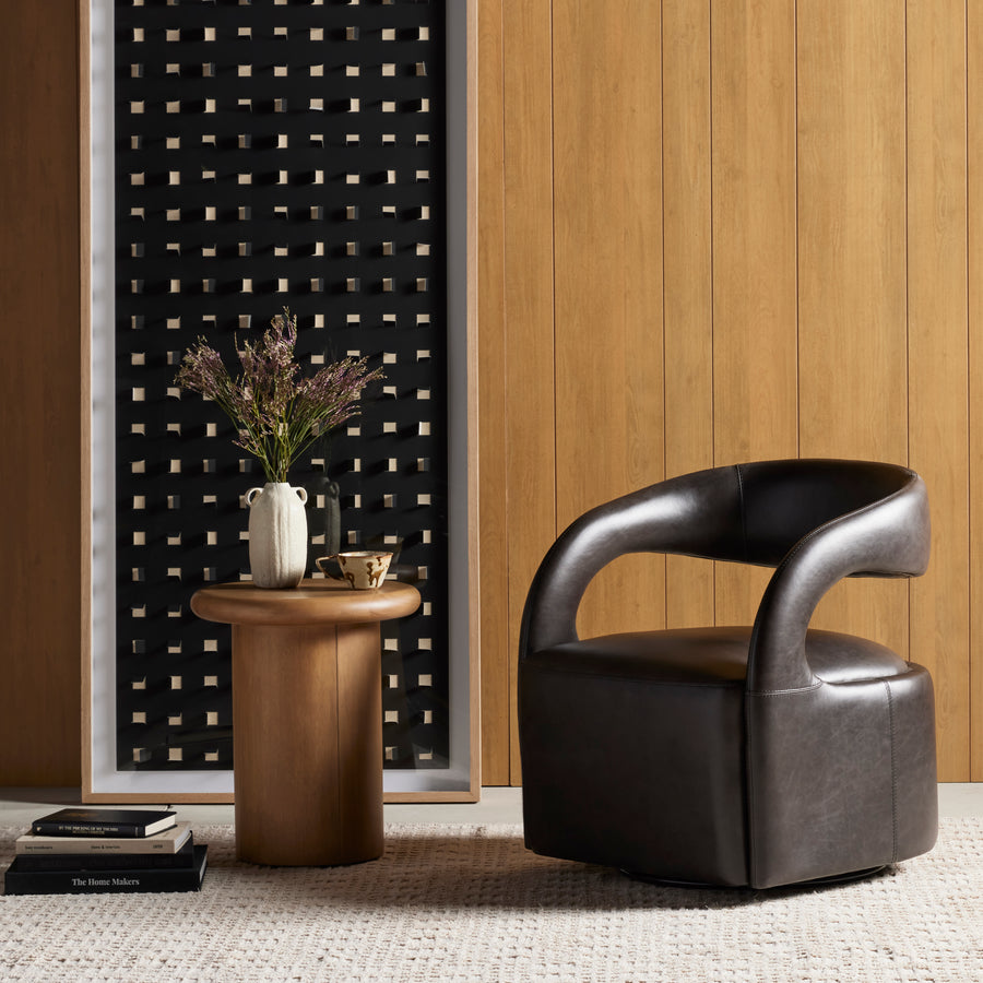This 360-swivel update of the fan-favorite stationary design makes quite the statement. Well curved and finely sculpted, black top-grain leather exclusive to Four Hands makes a uniquely shapely statement in any room.Overall Dimensions: 26"w x 26"d x 29"hColors: Sonoma ButterscotchMaterials: Top Grain LeatherWeight: 51.26Volume: 13. Amethyst Home provides interior design, new home construction design consulting, vintage area rugs, and lighting in the Laguna Beach metro area.