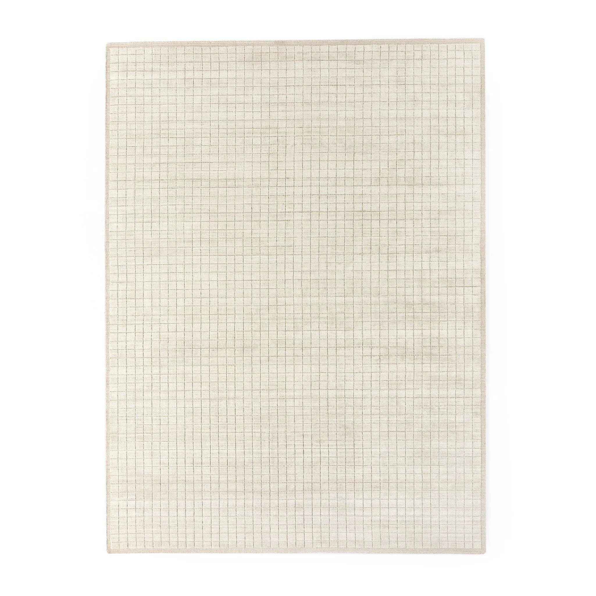 Monochromatic and linear, the subtle grid pattern of this hand-loomed wool-blend rug offers an innovative take on a neutral.Overall Dimensions96.00"w x 0.35"d x 120.00"hFull Details &amp; SpecificationsTear SheetCleaning Code : W (water-Based Amethyst Home provides interior design, new home construction design consulting, vintage area rugs, and lighting in the Charlotte metro area.