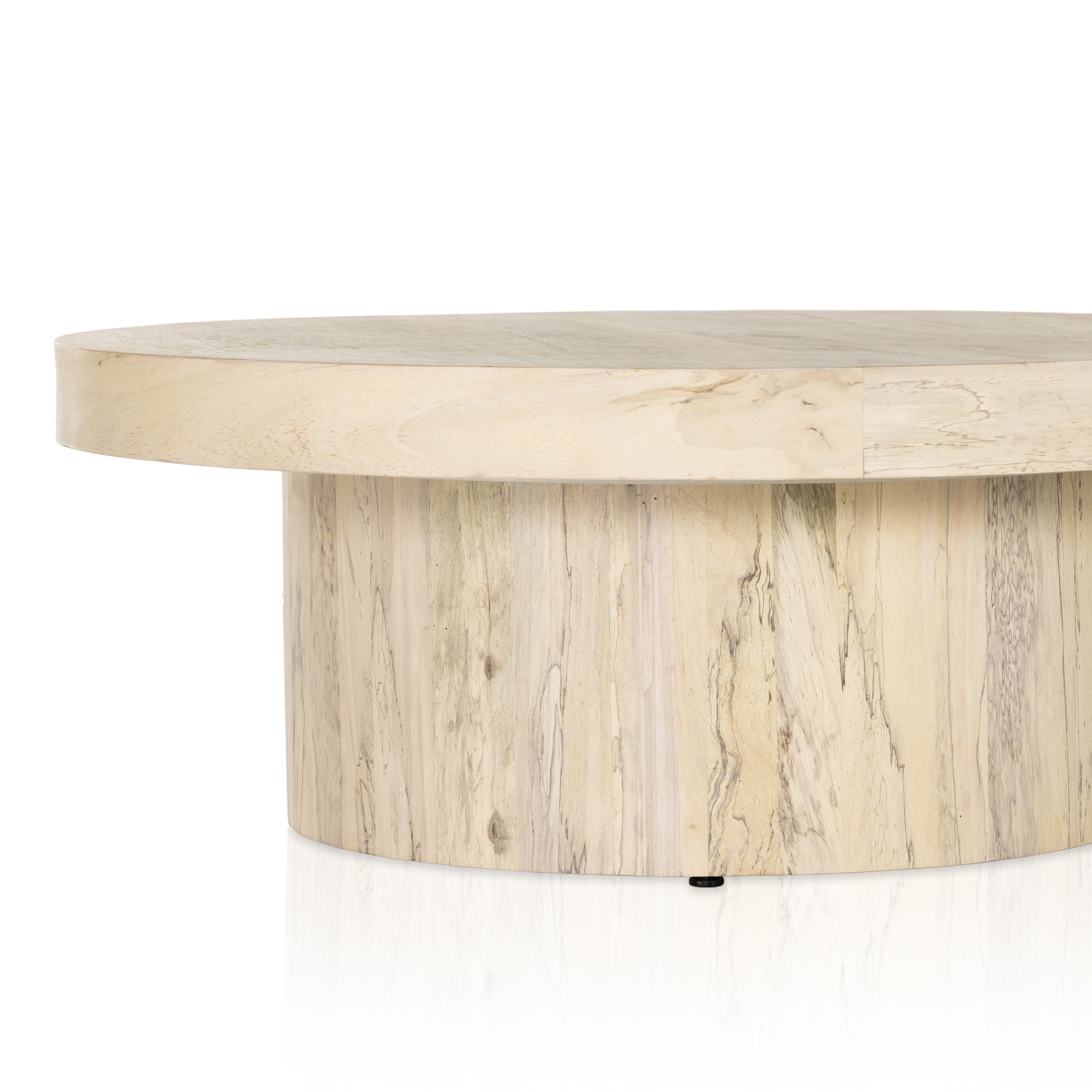 Stunning forces of nature are captured in a drum-style pedestal coffee table, natural yukas veneer is hand-shaped into a beautifully rounded silhouette for a warm, natural ombre look. Reflective of woods' natural character, a slight color variance is possible from piece to piece. Amethyst Home provides interior design, new home construction design consulting, vintage area rugs, and lighting in the Miami metro area.