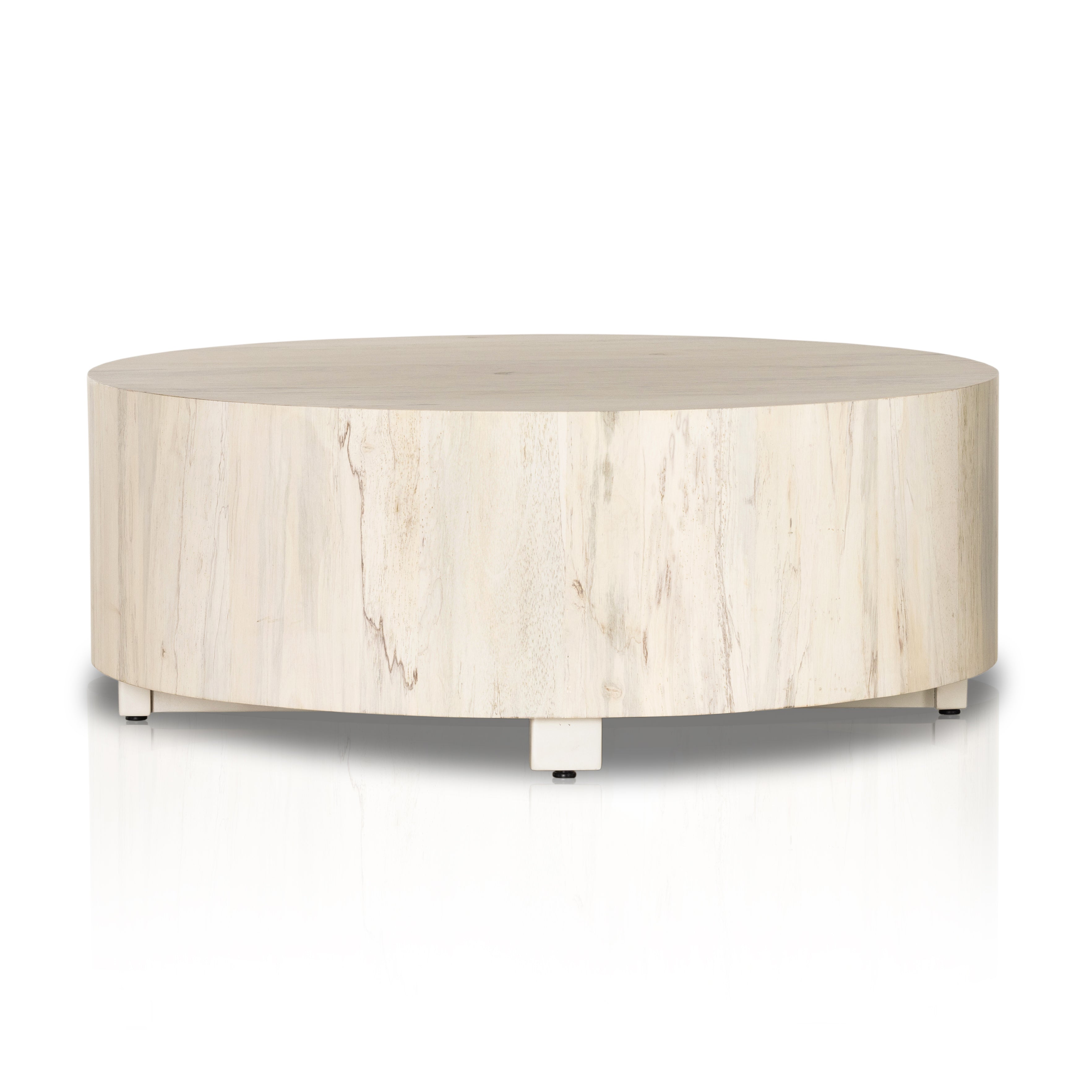 Stunning forces of nature are captured in a coffee table, as spalted primavera wood is hand-shaped into a cylindrical silhouette and finished in a white hue. Reflective of woods' natural character, a slight color variance is possible. Amethyst Home provides interior design, new construction, custom furniture, and area rugs in the Austin metro area.