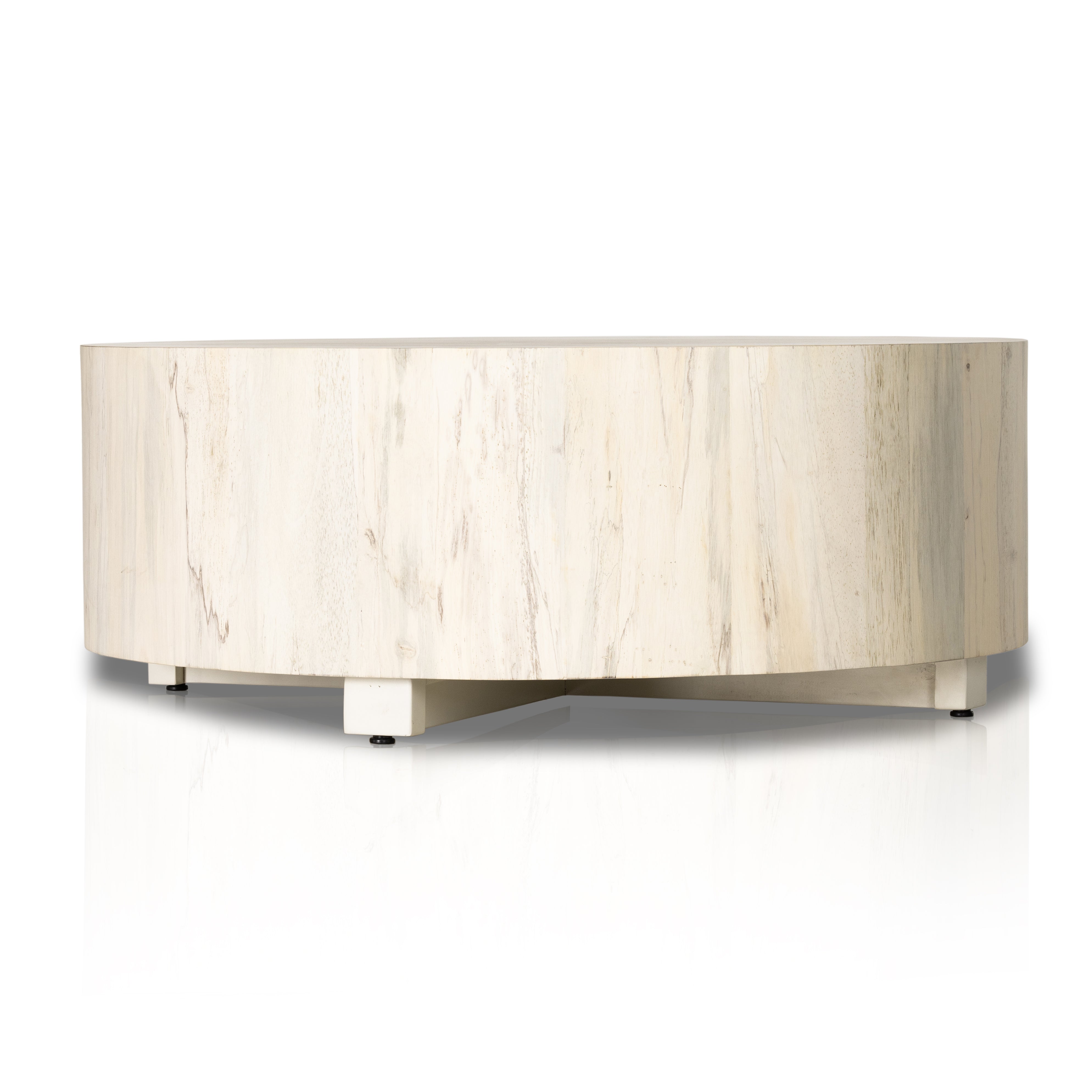 Stunning forces of nature are captured in a coffee table, as spalted primavera wood is hand-shaped into a cylindrical silhouette and finished in a white hue. Reflective of woods' natural character, a slight color variance is possible. Amethyst Home provides interior design, new construction, custom furniture, and area rugs in the Des Moines metro area.