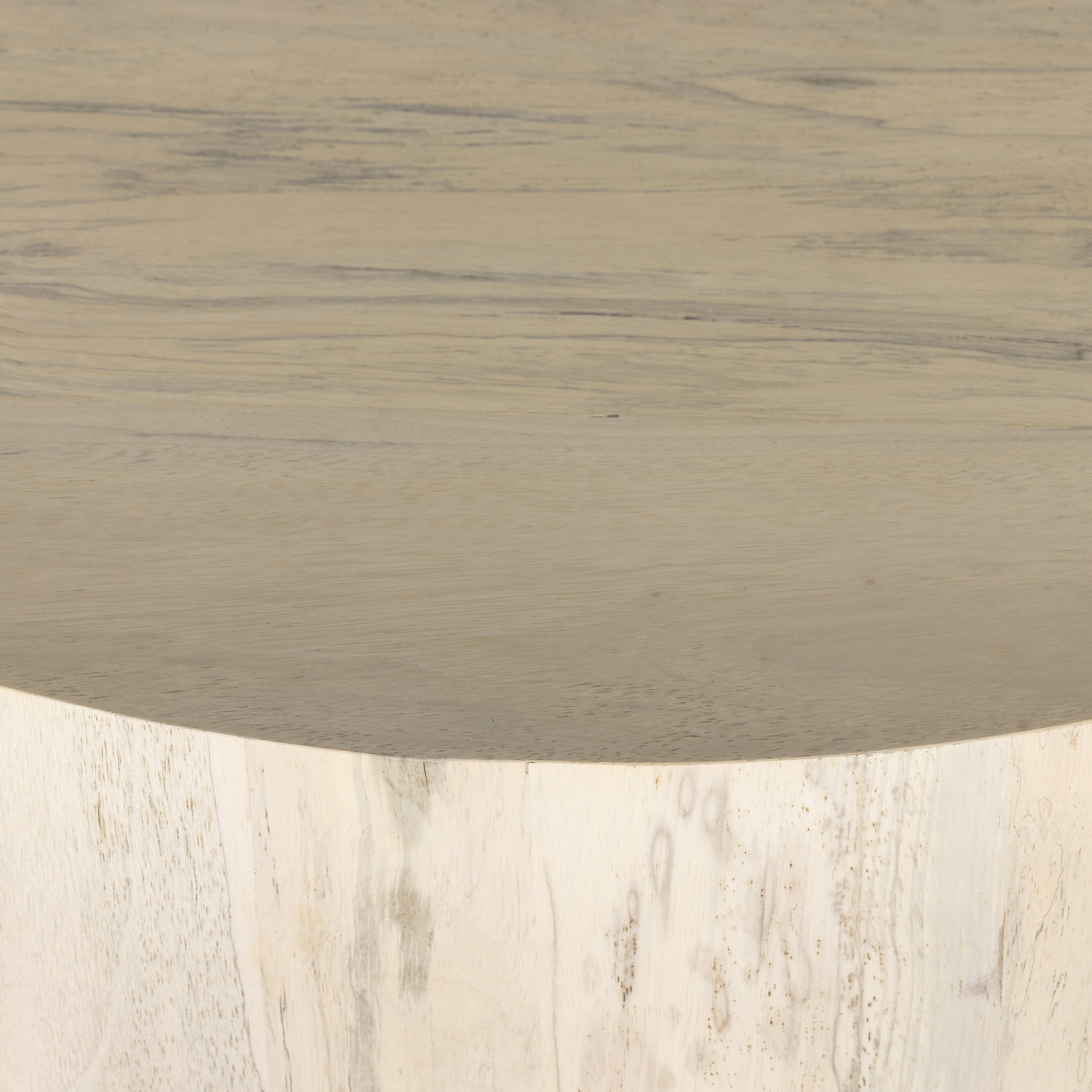 Stunning forces of nature are captured in a coffee table, as spalted primavera wood is hand-shaped into a cylindrical silhouette and finished in a white hue. Reflective of woods' natural character, a slight color variance is possible. Amethyst Home provides interior design, new construction, custom furniture, and area rugs in the Monterey metro area.