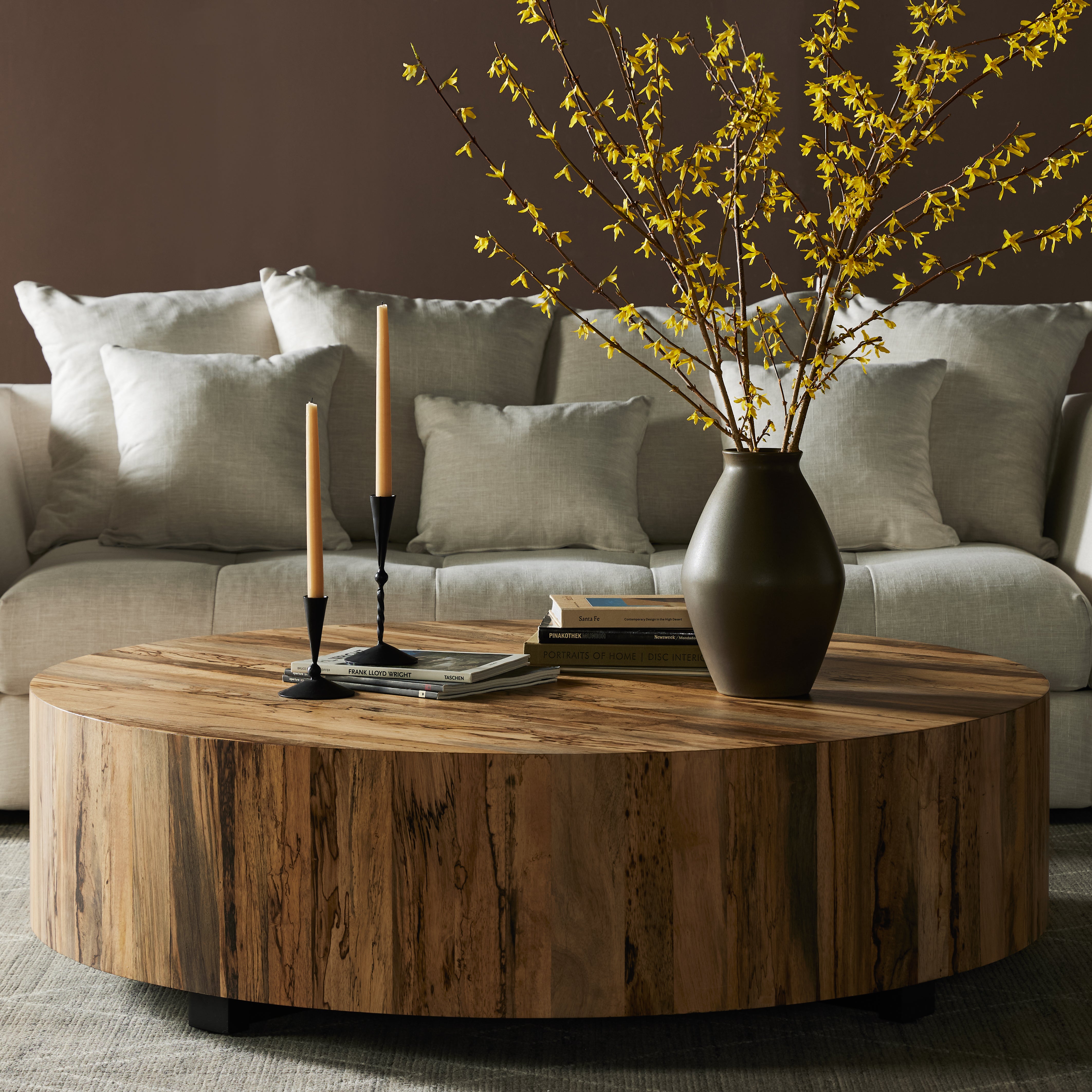 Stunning forces of nature are captured in a coffee table, as spalted primavera wood is hand-shaped into a cylindrical silhouette. Reflective of woods' natural character, a slight color variance is possible. Amethyst Home provides interior design, new construction, custom furniture, and area rugs in the Tampa metro area.