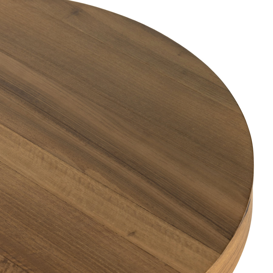 Stunning forces of nature are captured in a drum-style pedestal coffee table, natural yukas veneer is hand-shaped into a beautifully rounded silhouette for a warm, natural ombre look. Reflective of woods' natural character, a slight color variance is possible from piece to piece. Amethyst Home provides interior design, new home construction design consulting, vintage area rugs, and lighting in the Austin metro area.