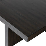 A substantially sized coffee table of smoked black oak features joint and connection construction for a design-forward look. Visible knots and graining add character.Collection: Haide Amethyst Home provides interior design, new home construction design consulting, vintage area rugs, and lighting in the Miami metro area.