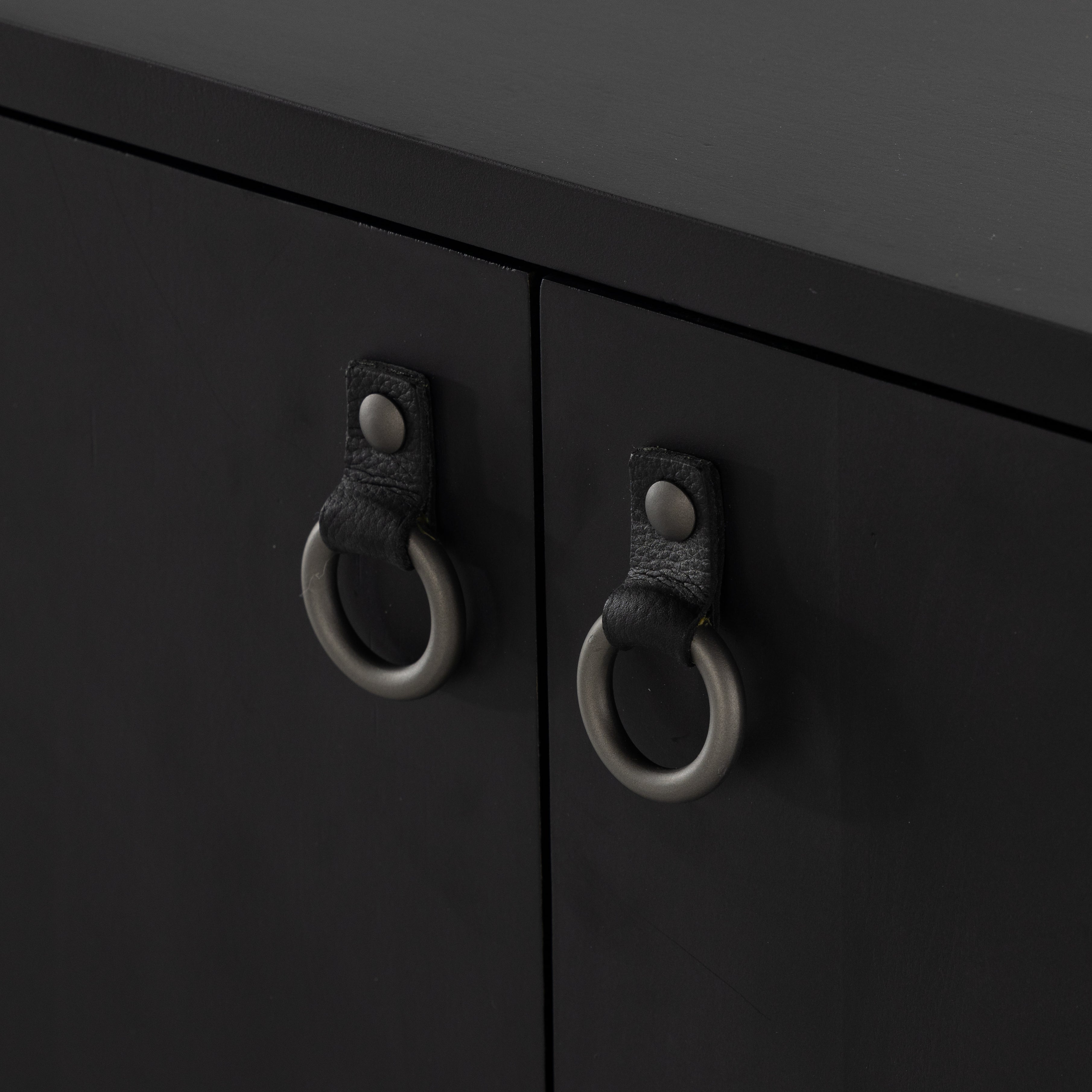 Featuring Isador Black Wash Poplar Bar Cabinet by Four Hands at Amethyst Home. Beautifully simple in spirit. Black-washed solid poplar forms a Parsons-style bar cabinet, with iron and leather hardware for a material-driven update to Shaker-inspired styling. Inside, dual drawers plus generous bottle storage await drink go-tos and bar accessories.Overall Dimensions: 36"W x 19"L x 32"H
. Amethyst Home provides interior design, new construction, custom furniture, and area rugs in the Omaha metro area.